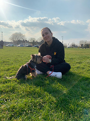 Myself and Max the Yorkshire Terrier. He is head of HR at my friends' queer-owned jewellery company Leftbians.